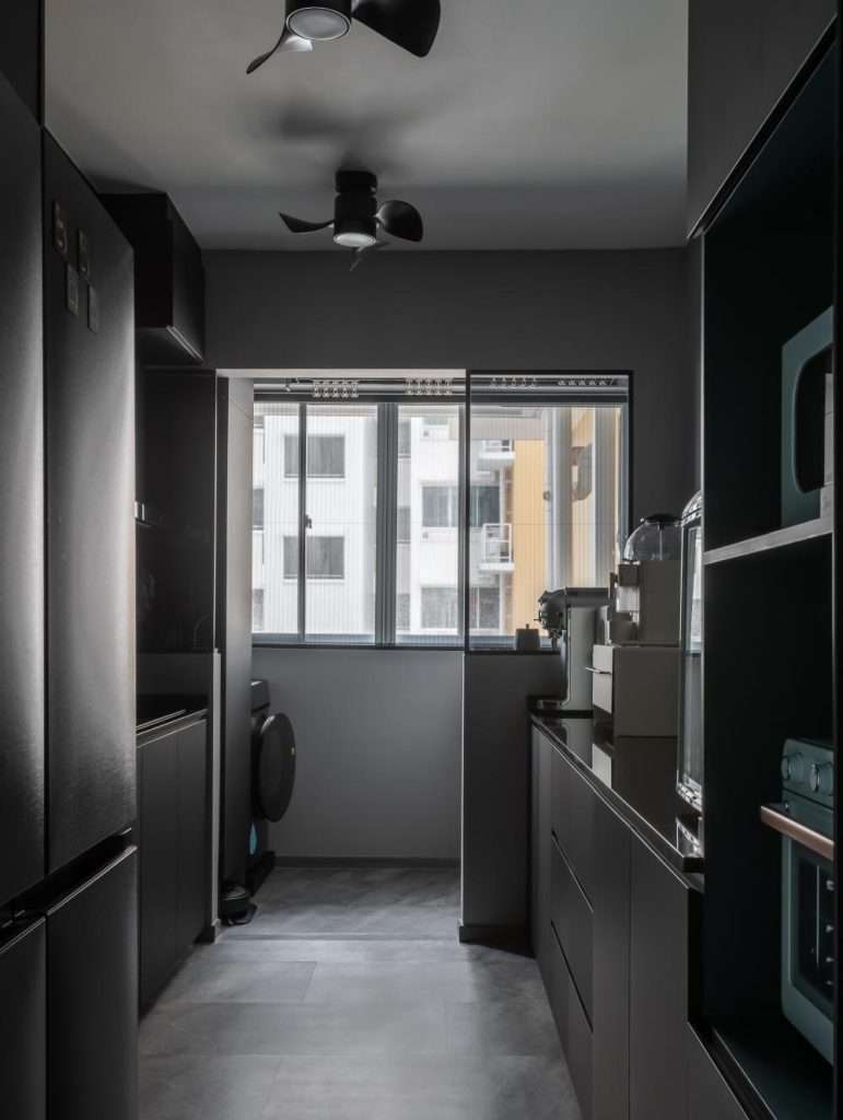 Modern Luxury Interior Design Ideas for HDB Homes in Singapore 7 Kitchen with dark marble backsplash and integrated appliances